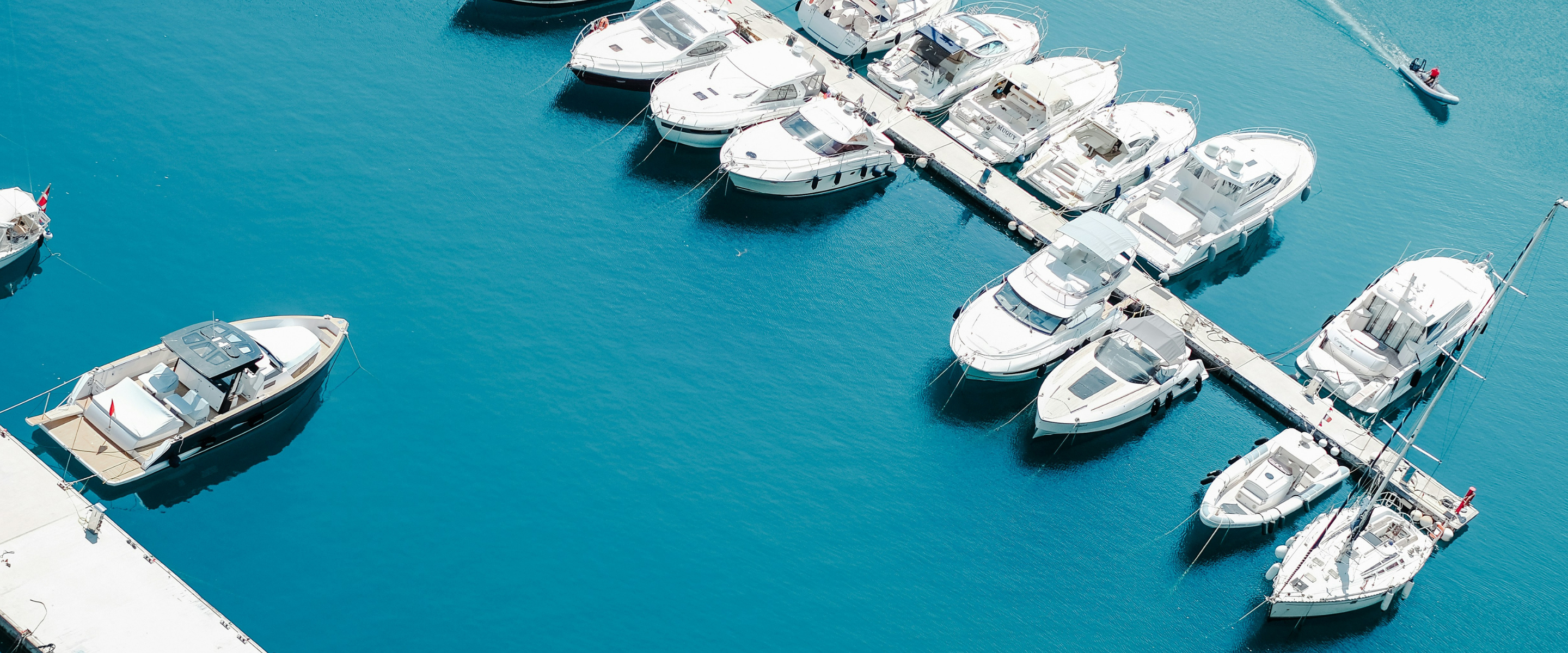 Isiteek product range page featuring a marina full of boats.